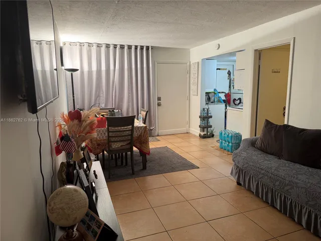 a view of a workspace with furniture