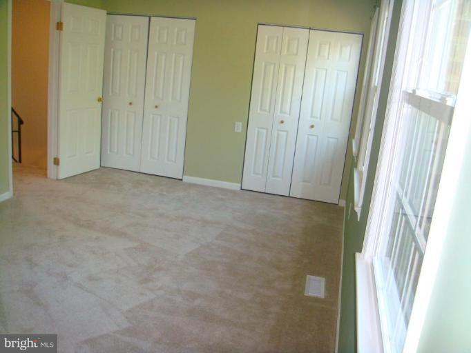 8029 Carbondale Way Springfield, VA 22153 - Photo 23 of 30 a view of an empty room and window