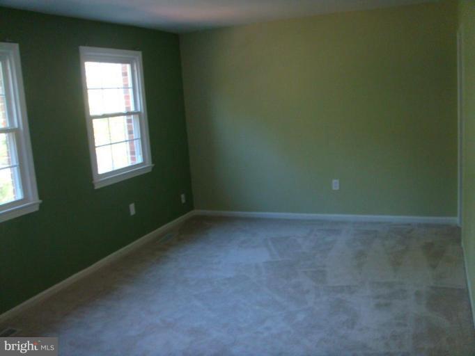 8029 Carbondale Way Springfield, VA 22153 - Photo 24 of 30 a view of an empty room with a window
