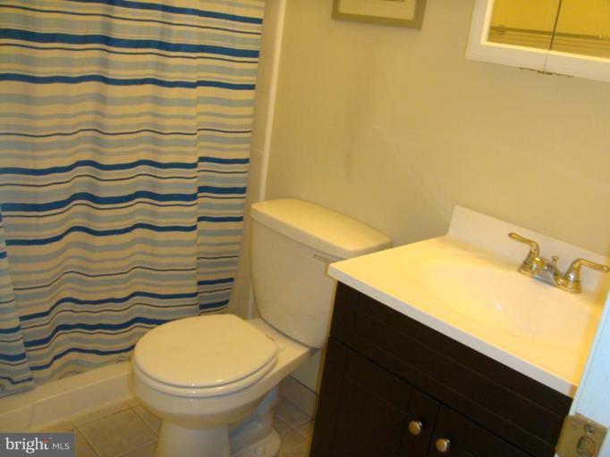 8029 Carbondale Way Springfield, VA 22153 - Photo 25 of 30 a bathroom with a sink and a toilet