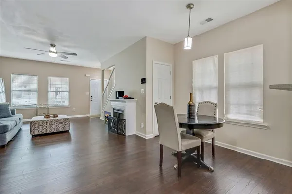 a view of a livingroom with furniture and a window