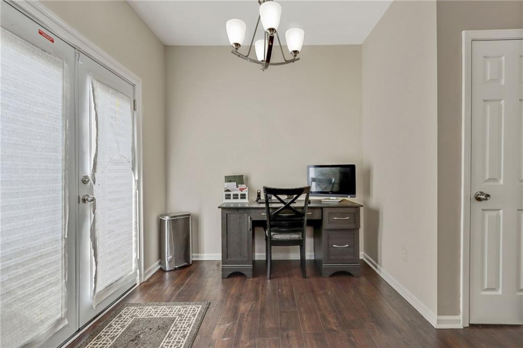 3616 Ginnis Road, Unit 1 Atlanta, GA 30331 - Photo 9 of 20 a view of a workspace with furniture and wooden floor