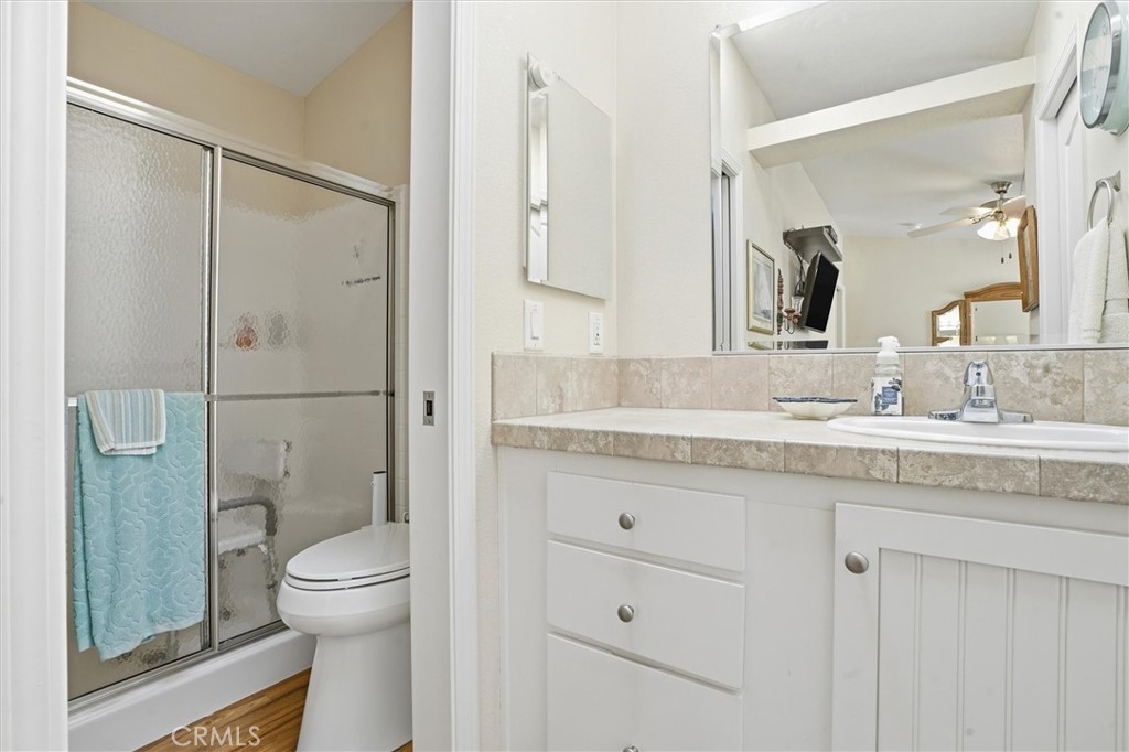 500 Atascadero Road Morro Bay, CA 93442 - Photo 20 of 27 a bathroom with a granite countertop sink toilet and shower