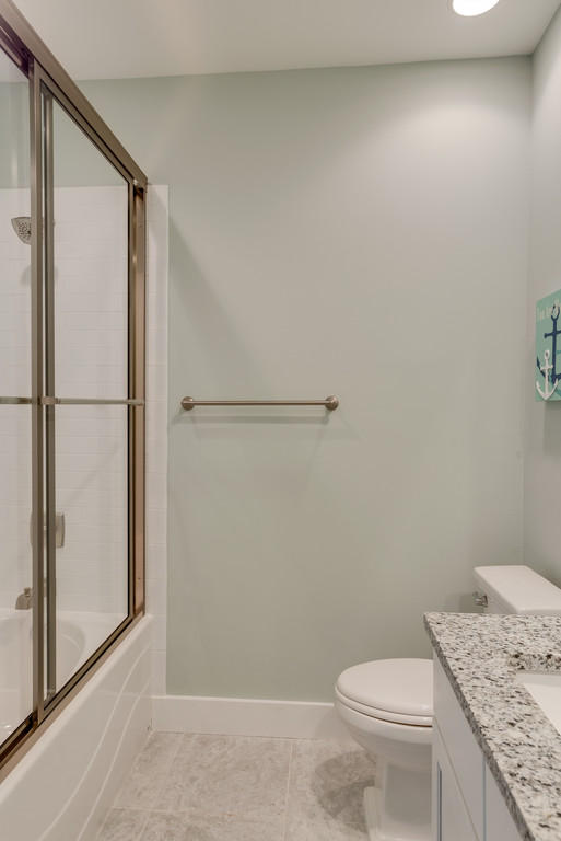 Lot 86 Constant Avenue Santa Rosa Beach, FL 32459 - Photo 15 of 31 a bathroom with a granite countertop sink toilet and a shower