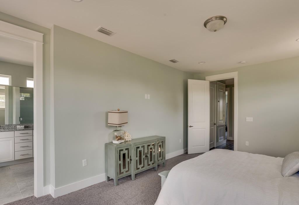 Lot 86 Constant Avenue Santa Rosa Beach, FL 32459 - Photo 20 of 31 a bedroom with a bed and table