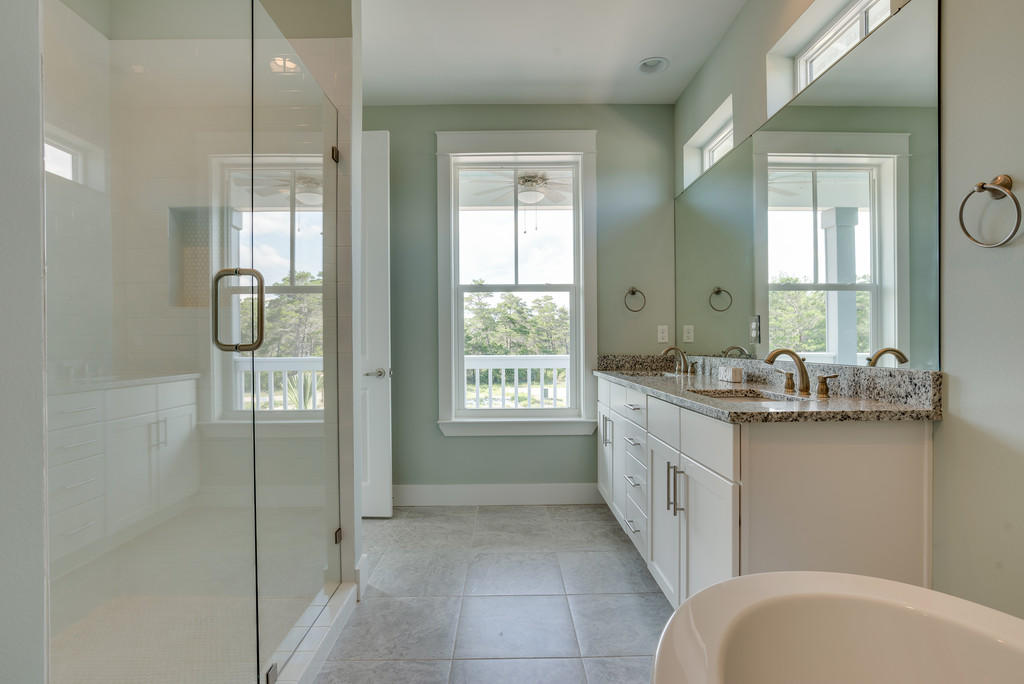 Lot 86 Constant Avenue Santa Rosa Beach, FL 32459 - Photo 23 of 31 a bathroom with a double vanity sink toilet and shower