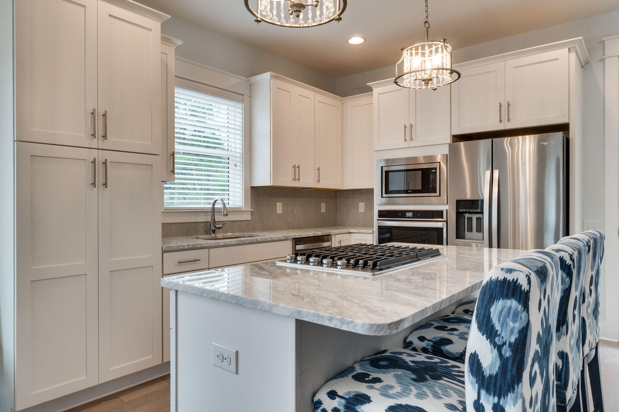 Lot 86 Constant Avenue Santa Rosa Beach, FL 32459 - Photo 31 of 31 a kitchen with stainless steel appliances granite countertop a stove refrigerator and microwave