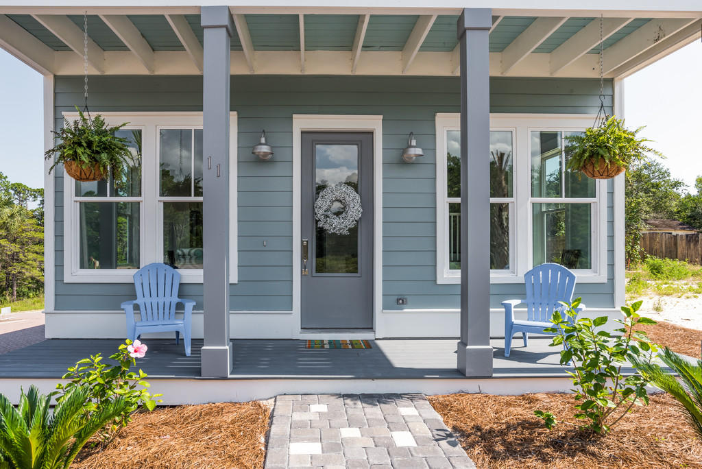 Lot 86 Constant Avenue Santa Rosa Beach, FL 32459 - Photo 4 of 31 a front view of a house with a porch