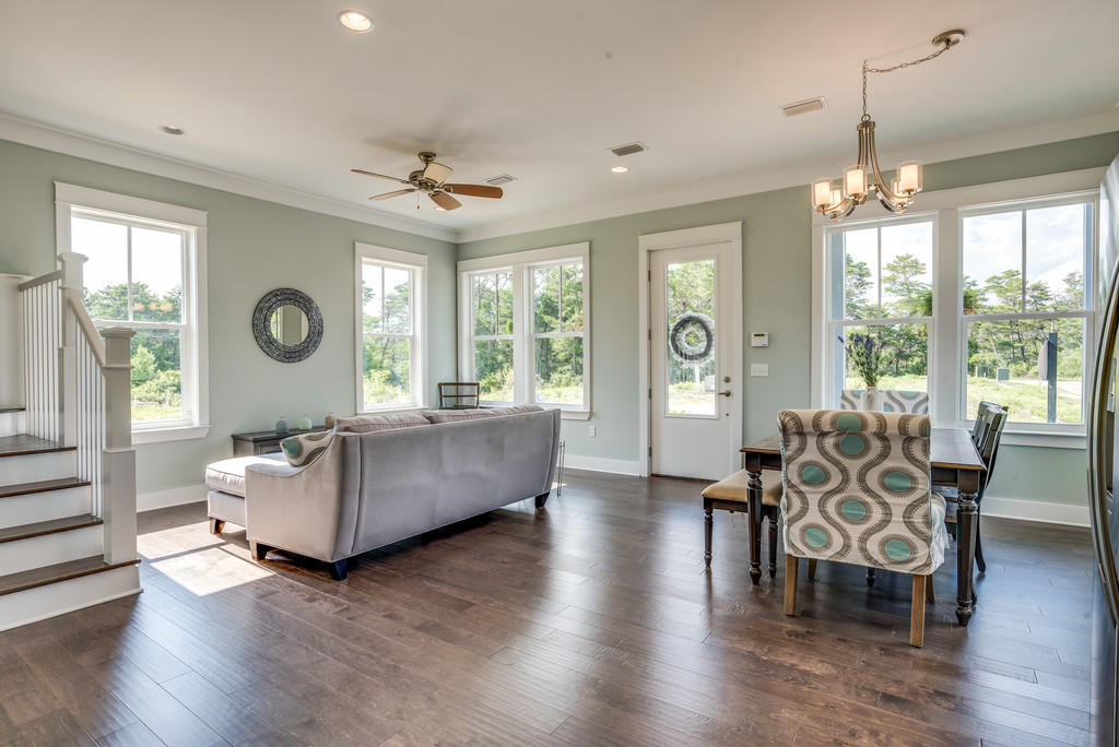 Lot 86 Constant Avenue Santa Rosa Beach, FL 32459 - Photo 10 of 31 a living room with furniture chandelier and a large window