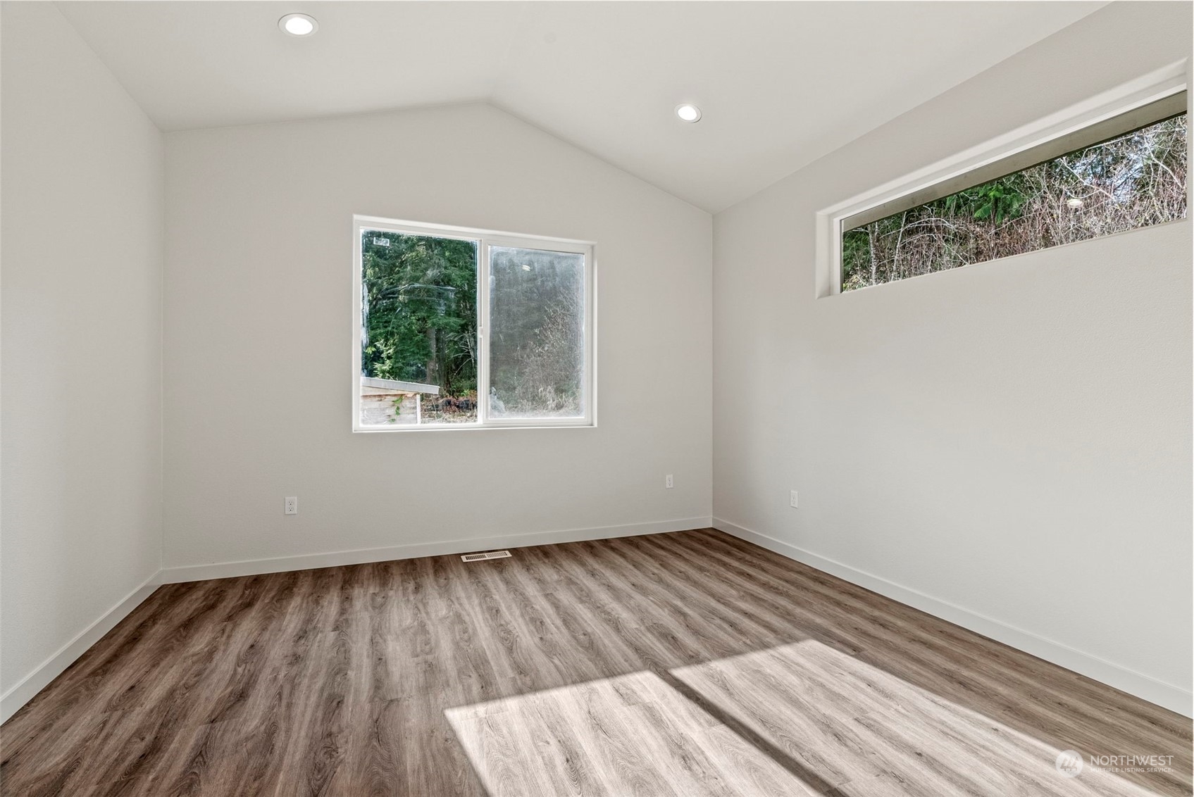 147 Hunter Road Longview, WA 98632 - Photo 18 of 31 a view of room with window and hardwood floor