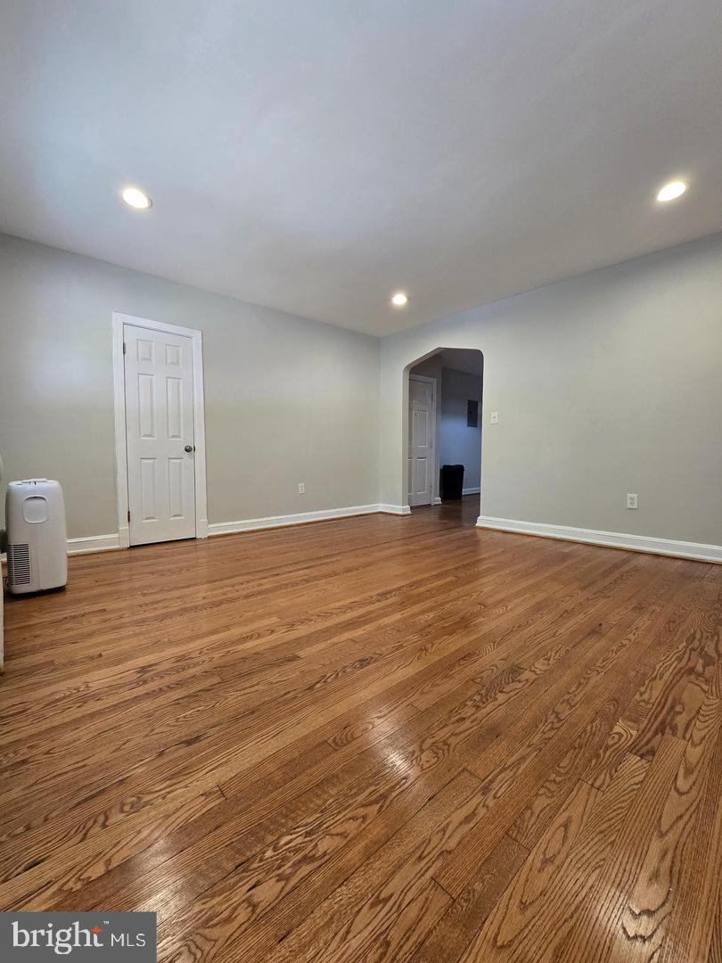 4044 7th Street Northeast, Unit 4 Washington, DC 20017 - Photo 5 of 9 a view of a room with wooden floor