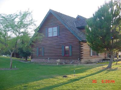 13645 Millerton Road Prather, CA 93651 - Photo 2 of 9 Side of house taken from the east. You can see a glimpse of the guest house though the trees.