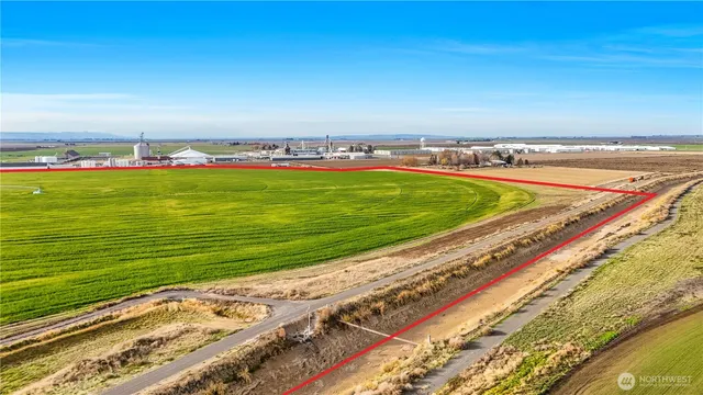 a view of a swimming pool and an outdoor space