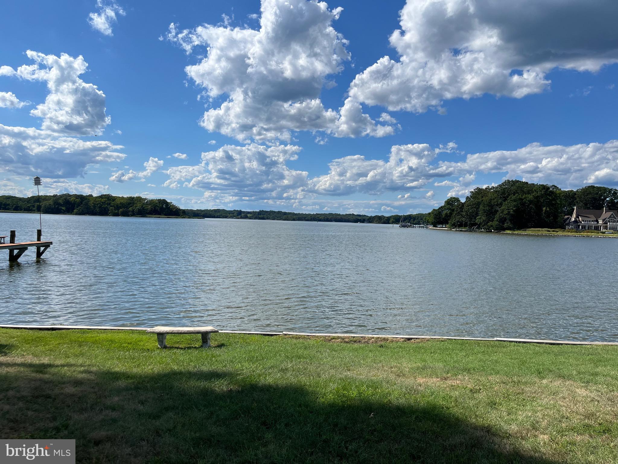 a view of a lake with a big yard