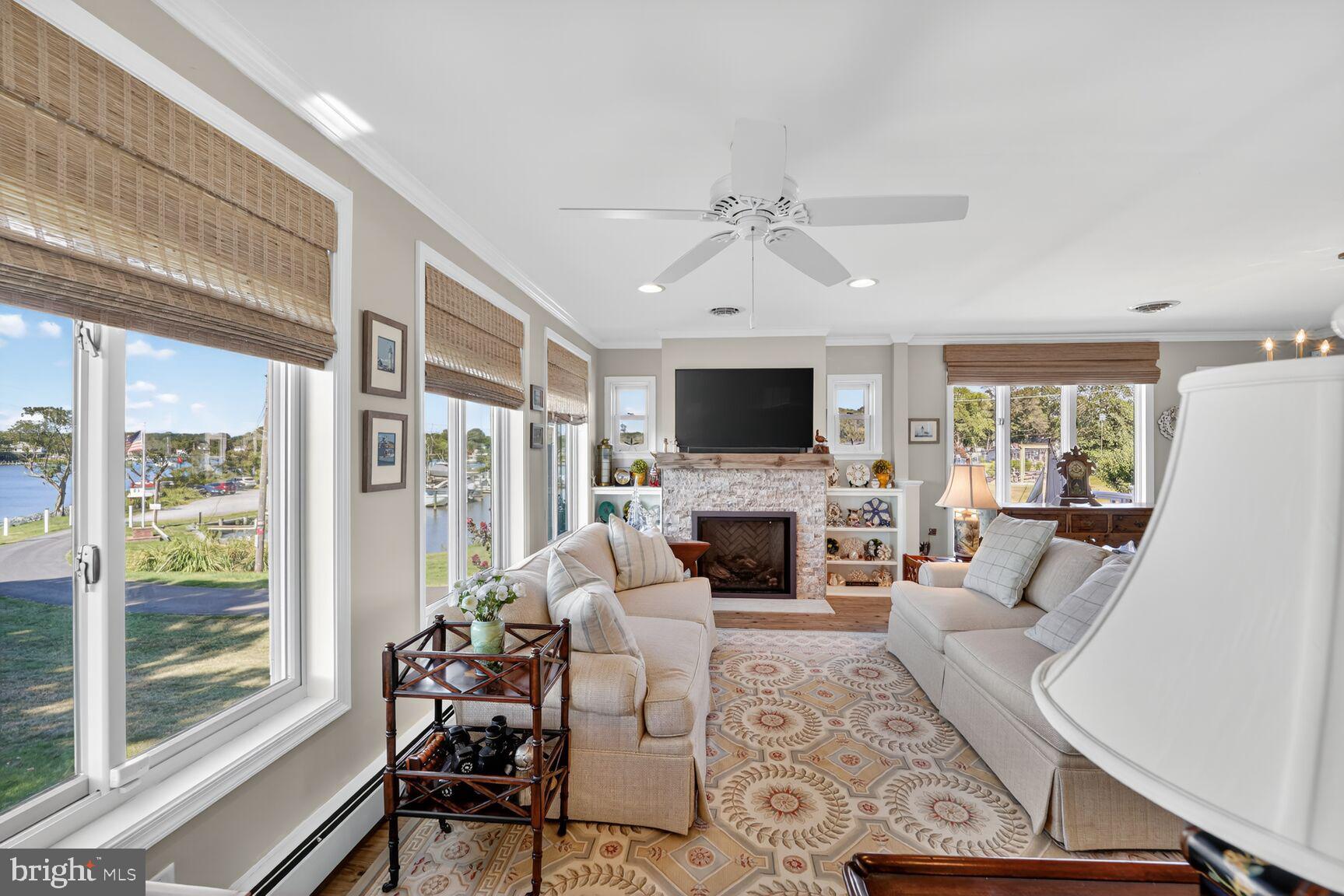 1663 Cliff Drive Edgewater, MD 21037 - Photo 13 of 53 Gas fireplace with built in bookcases.