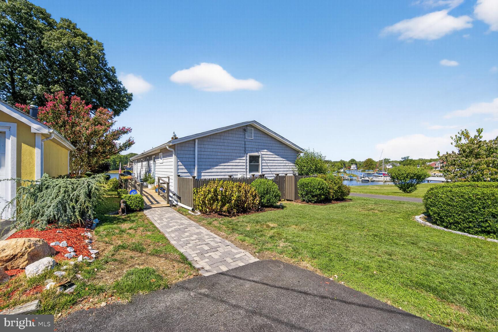 1663 Cliff Drive Edgewater, MD 21037 - Photo 42 of 53 Driveway and cobblestone walkway to back deck ramp