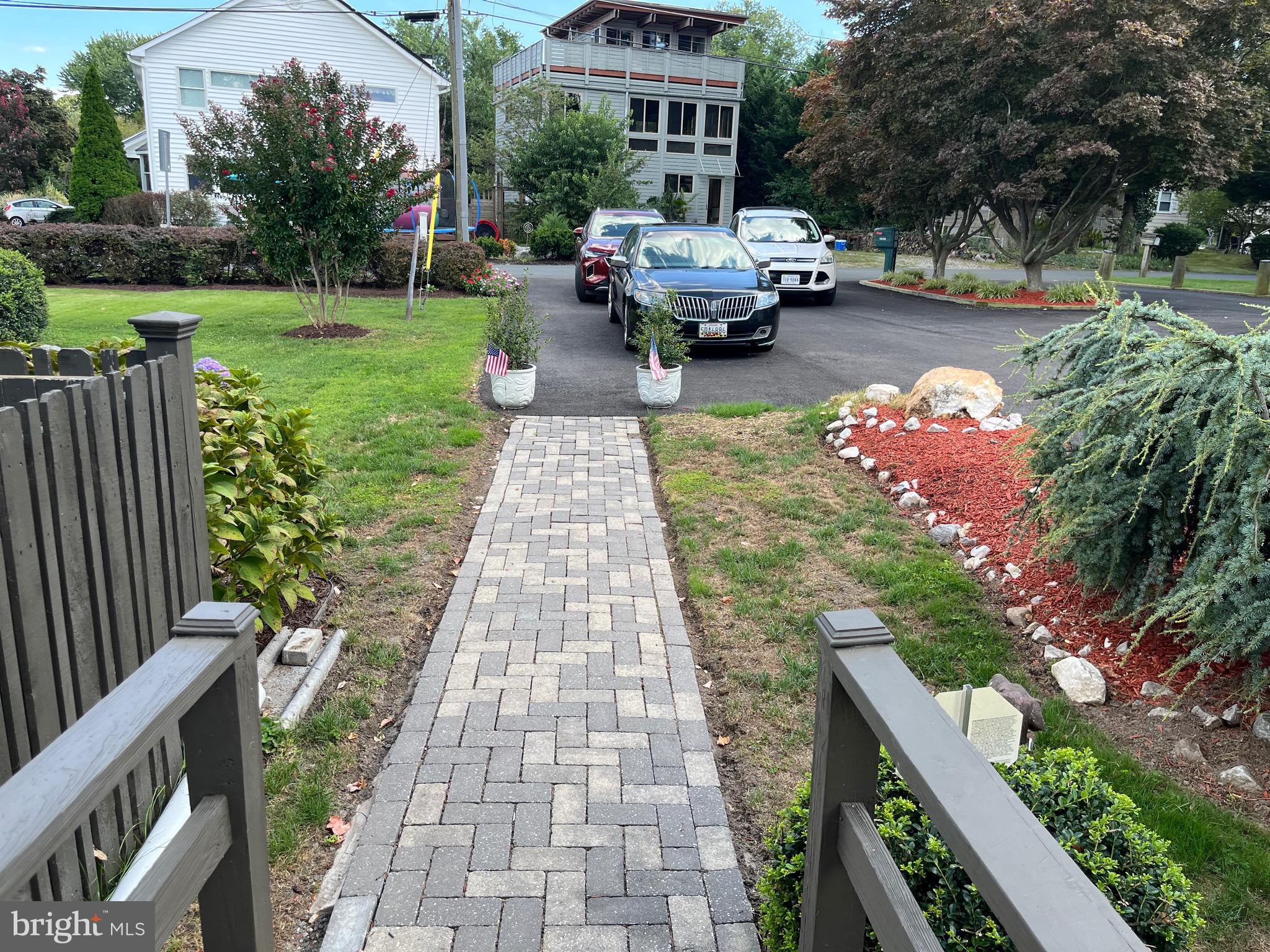 1663 Cliff Drive Edgewater, MD 21037 - Photo 10 of 53 Cobblestone walkway from deck to driveway.