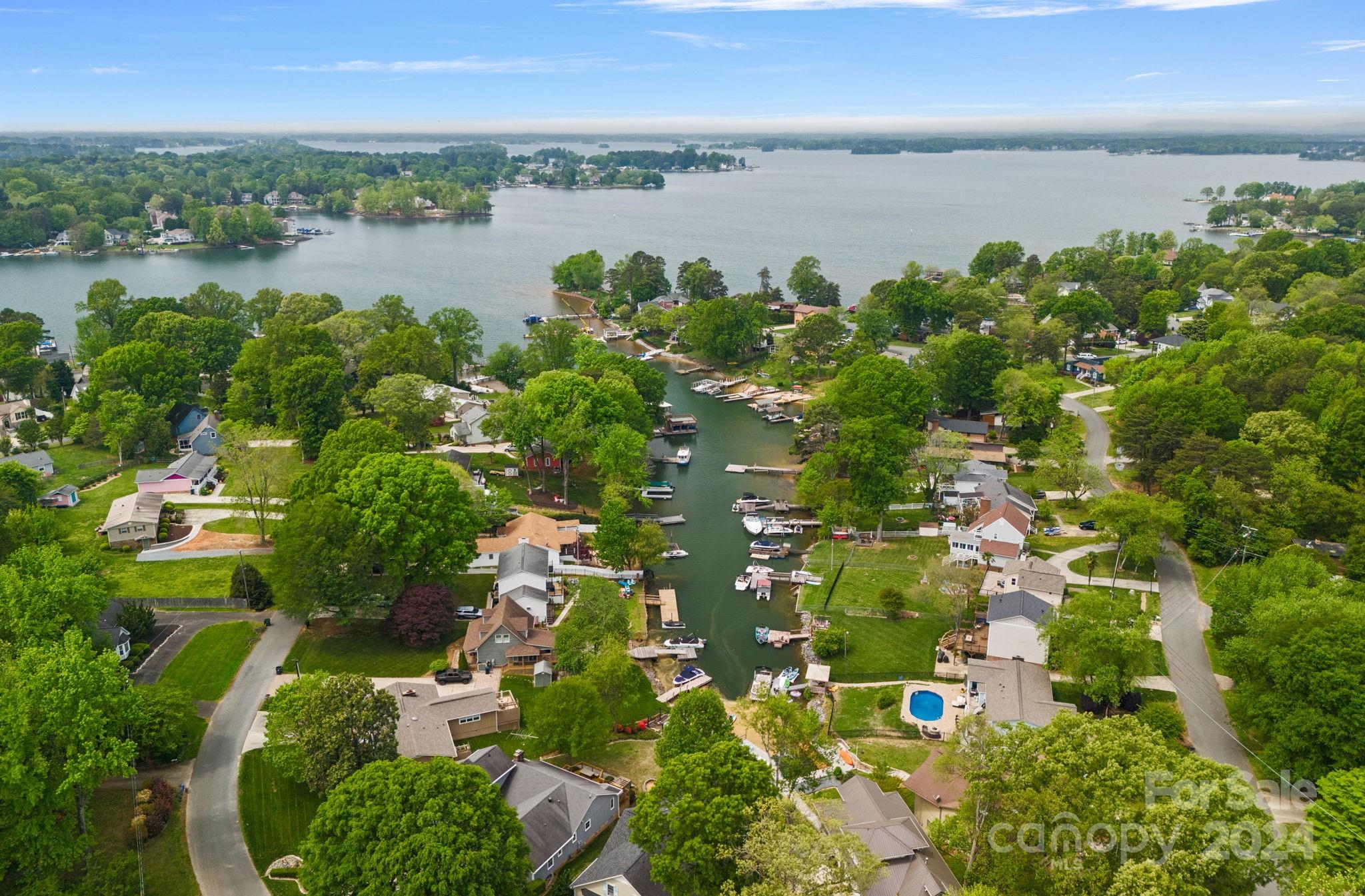 21212 Rio Oro Drive Cornelius, NC 28031 - Photo 2 of 41 a view of a lake with houses