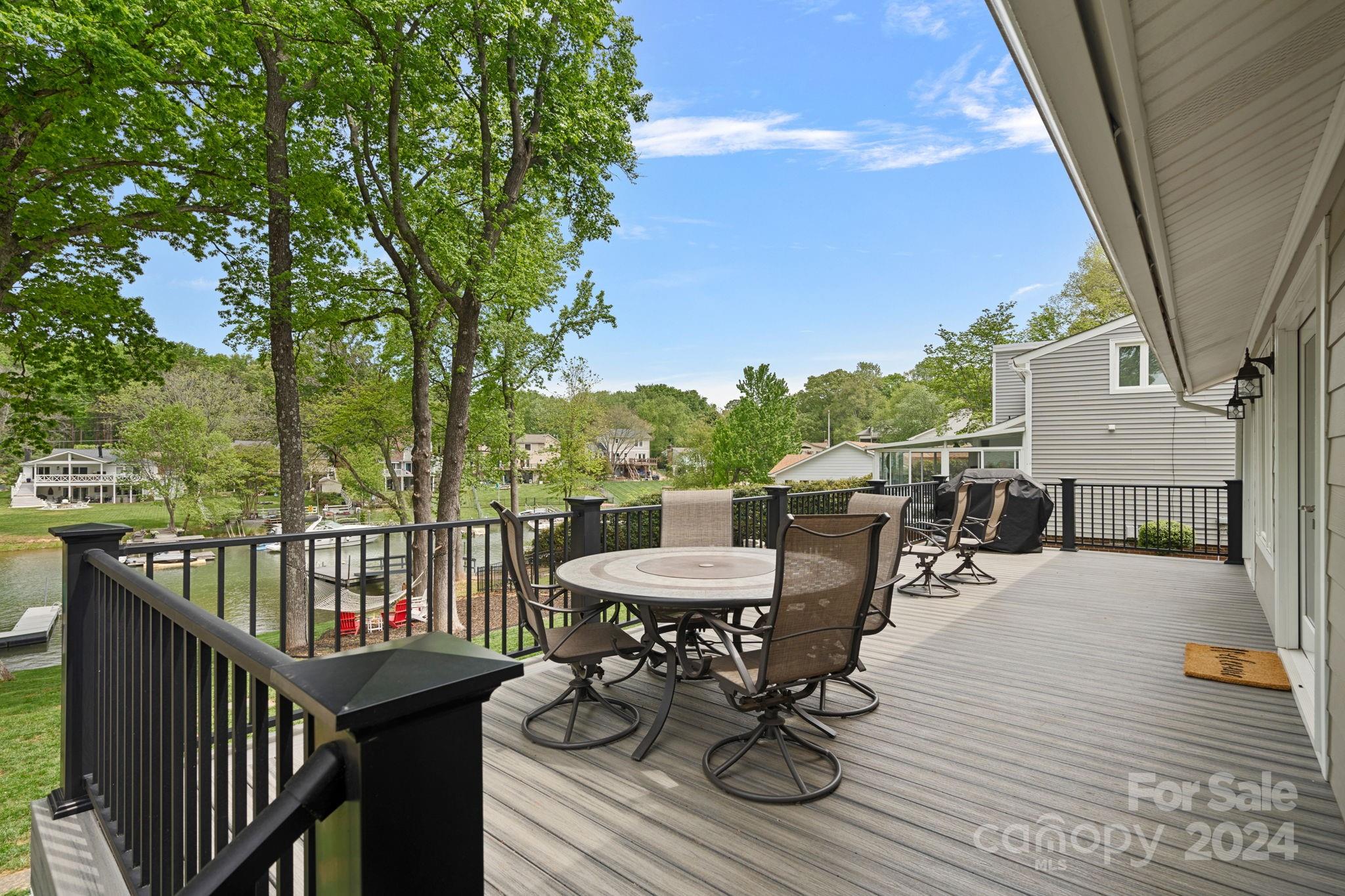 21212 Rio Oro Drive Cornelius, NC 28031 - Photo 23 of 41 a view of a balcony with chairs and a table