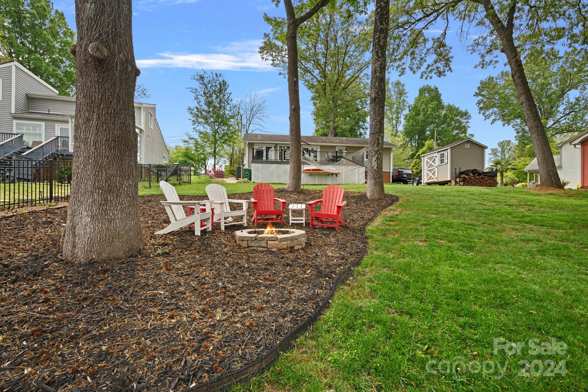 21212 Rio Oro Drive Cornelius, NC 28031 - Photo 25 of 41 a view of a yard with furniture and a table
