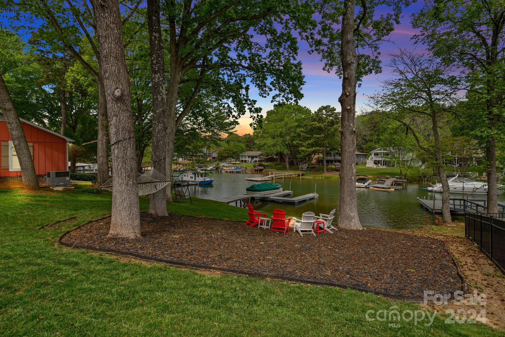 21212 Rio Oro Drive Cornelius, NC 28031 - Photo 32 of 41 a view of a park with large trees
