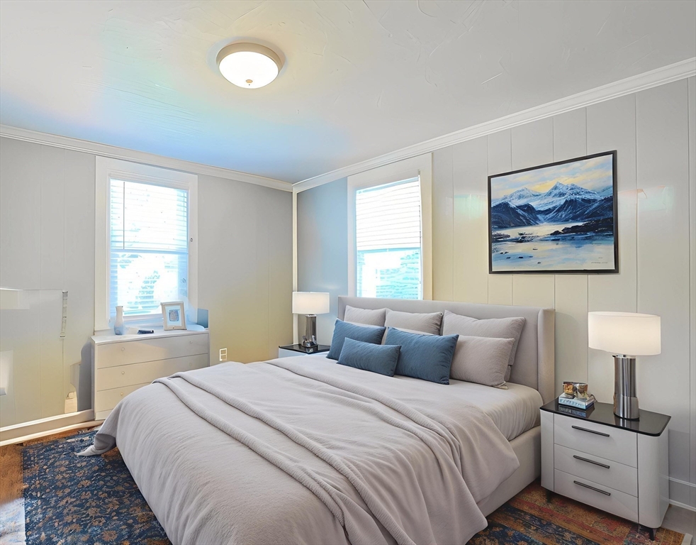 23 Superior Road Worcester, MA 01604 - Photo 15 of 32 a bedroom with a large bed and a window