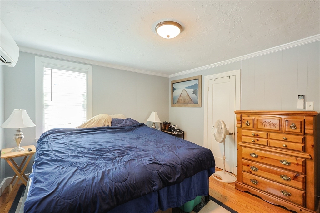 23 Superior Road Worcester, MA 01604 - Photo 19 of 32 a bedroom with a bed and a closet