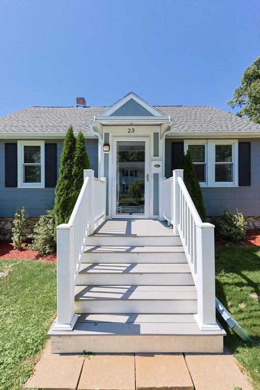 23 Superior Road Worcester, MA 01604 - Photo 4 of 32 a front view of a house with a yard and potted plants