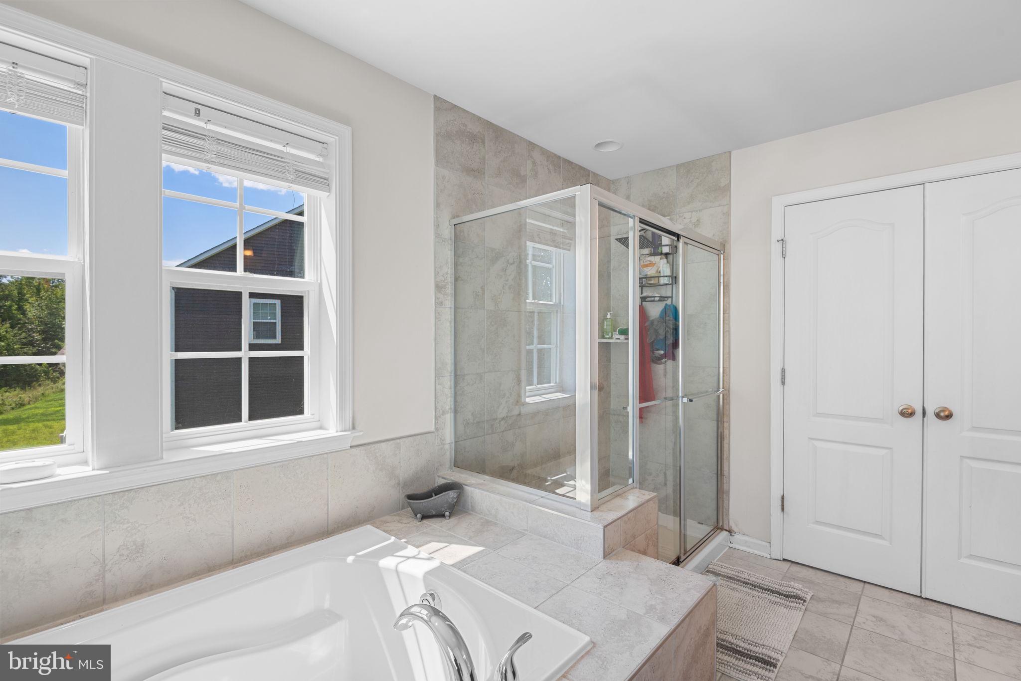 6640 Timber Ridge Lane Bryans Road, MD 20616 - Photo 30 of 59 Primary Bathroom Soaking Tub & Shower