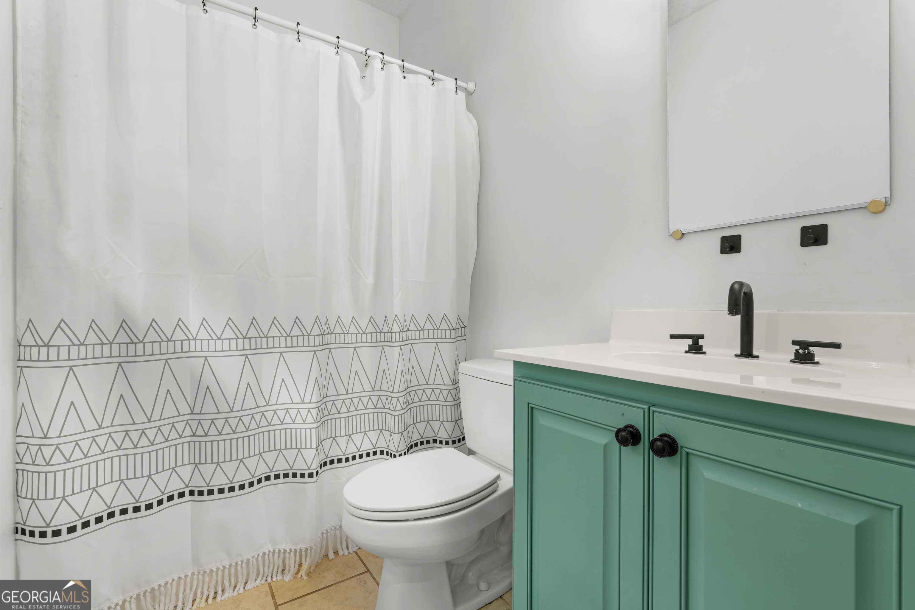 480 Best Bridge Road Sylvania, GA 30467 - Photo 34 of 57 a bathroom with a sink a toilet and shower