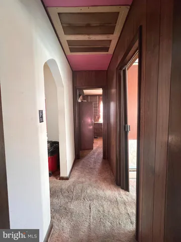 a view of a hallway with entryway