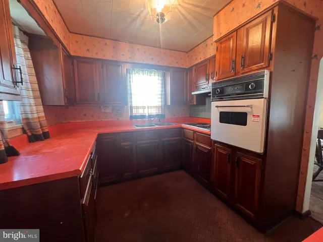 a view of walk in closet with window