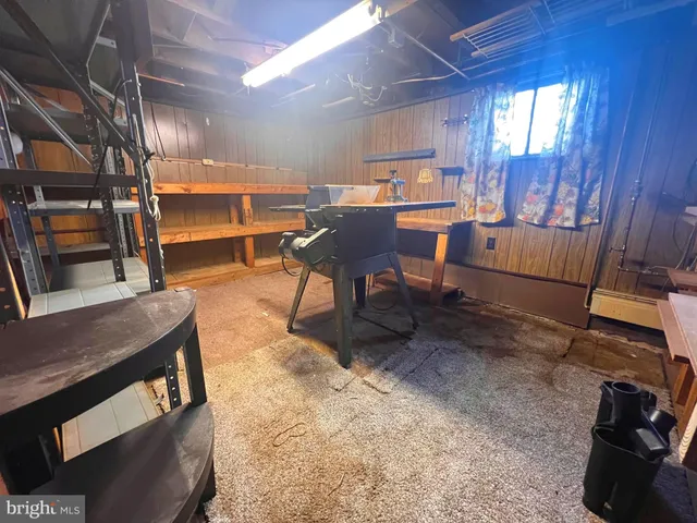 a room with furniture and a book shelf