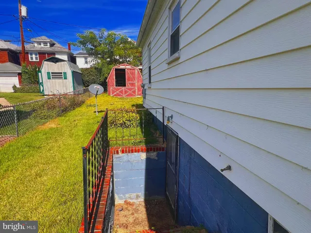 a view of living room with furniture and window