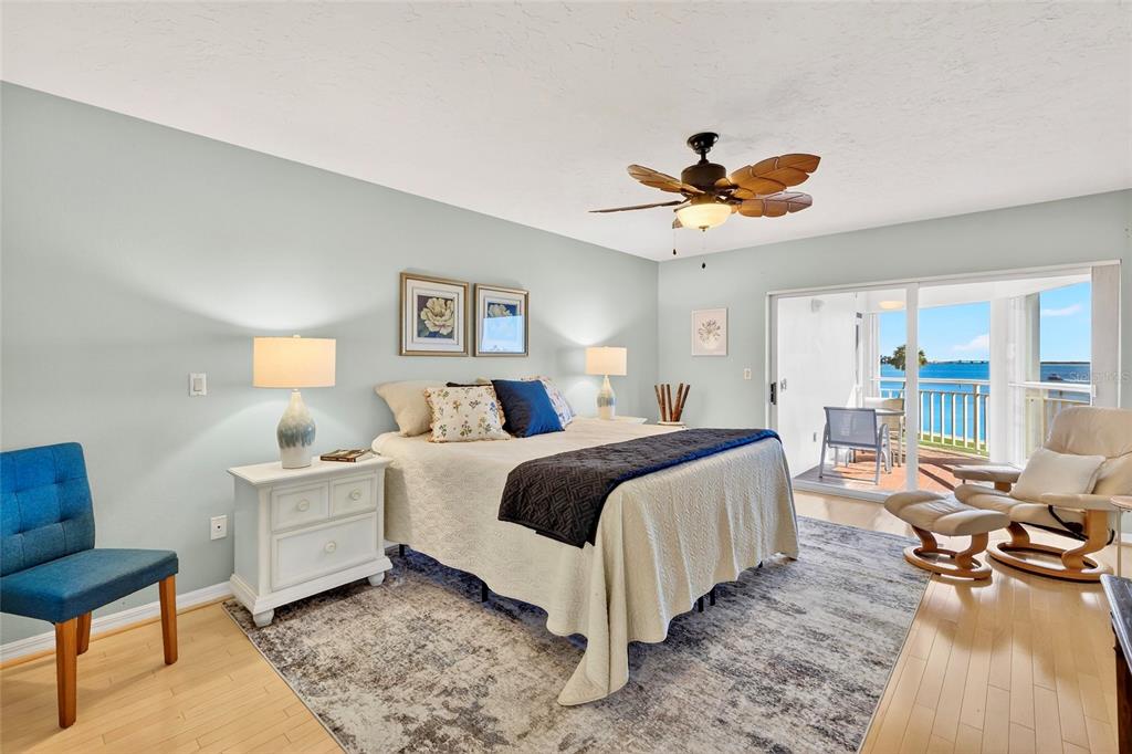 11000 Placida Road, Unit 2804 Placida, FL 33946 - Photo 13 of 56 a bedroom with bed and a large window