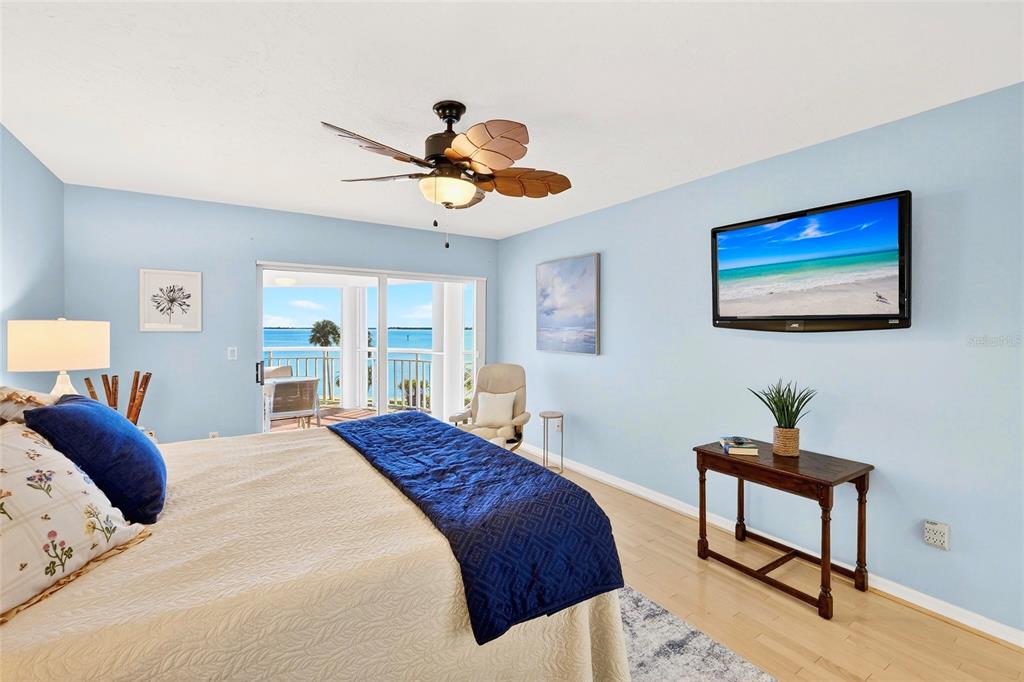 11000 Placida Road, Unit 2804 Placida, FL 33946 - Photo 14 of 56 a bedroom with a large bed and a window