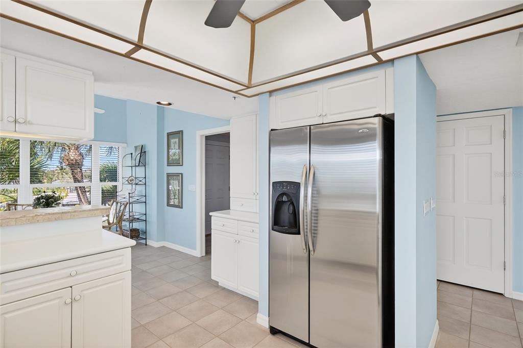 11000 Placida Road, Unit 2804 Placida, FL 33946 - Photo 20 of 56 a kitchen with stainless steel appliances a refrigerator and a sink