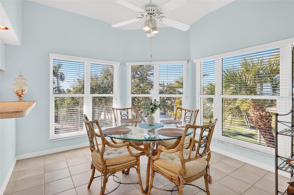 11000 Placida Road, Unit 2804 Placida, FL 33946 - Photo 22 of 56 a view of a dining room with furniture window and outside view