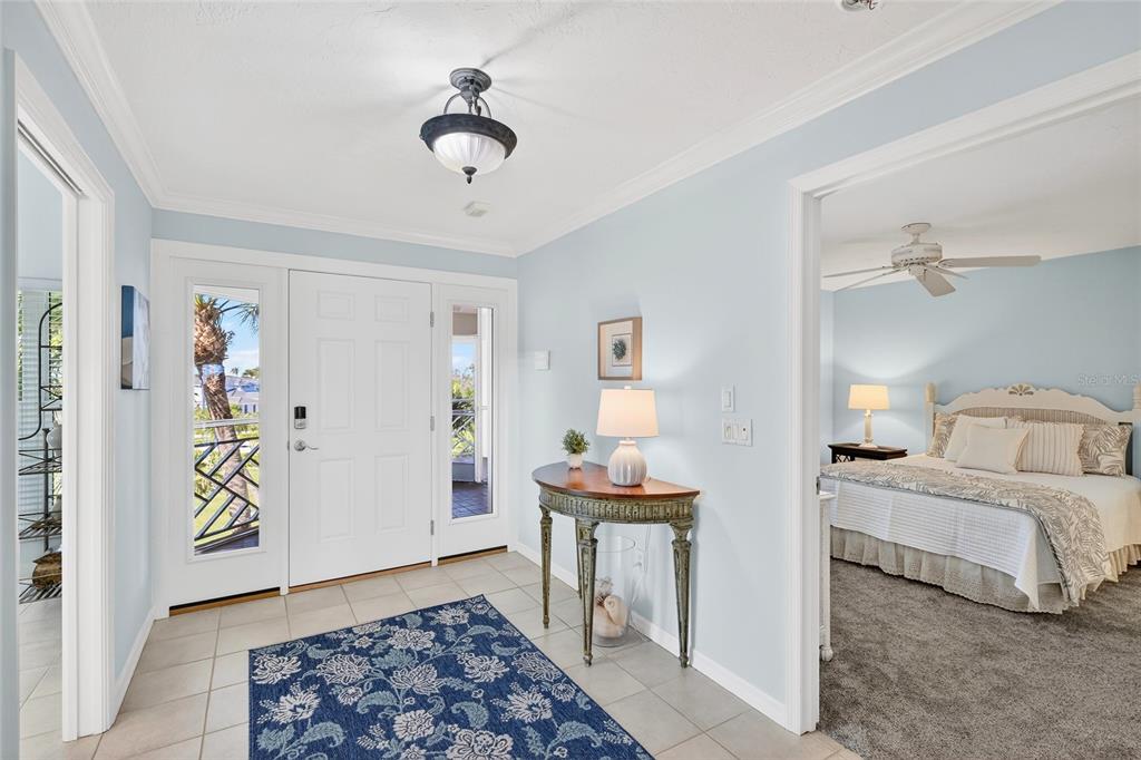 11000 Placida Road, Unit 2804 Placida, FL 33946 - Photo 23 of 56 a bedroom with a bed and a table