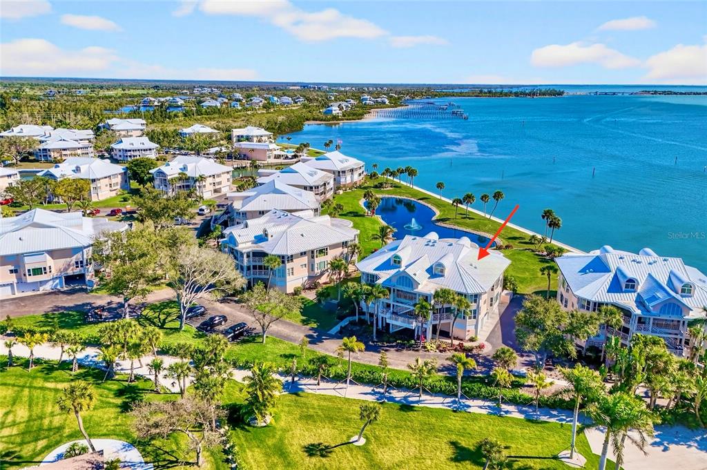 11000 Placida Road, Unit 2804 Placida, FL 33946 - Photo 38 of 56 an aerial view of ocean and residential houses with outdoor space