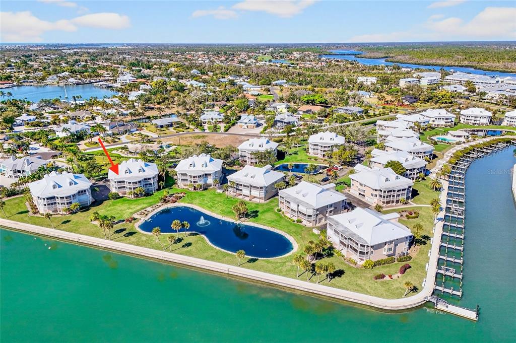11000 Placida Road, Unit 2804 Placida, FL 33946 - Photo 39 of 56 an aerial view of residential houses with outdoor space