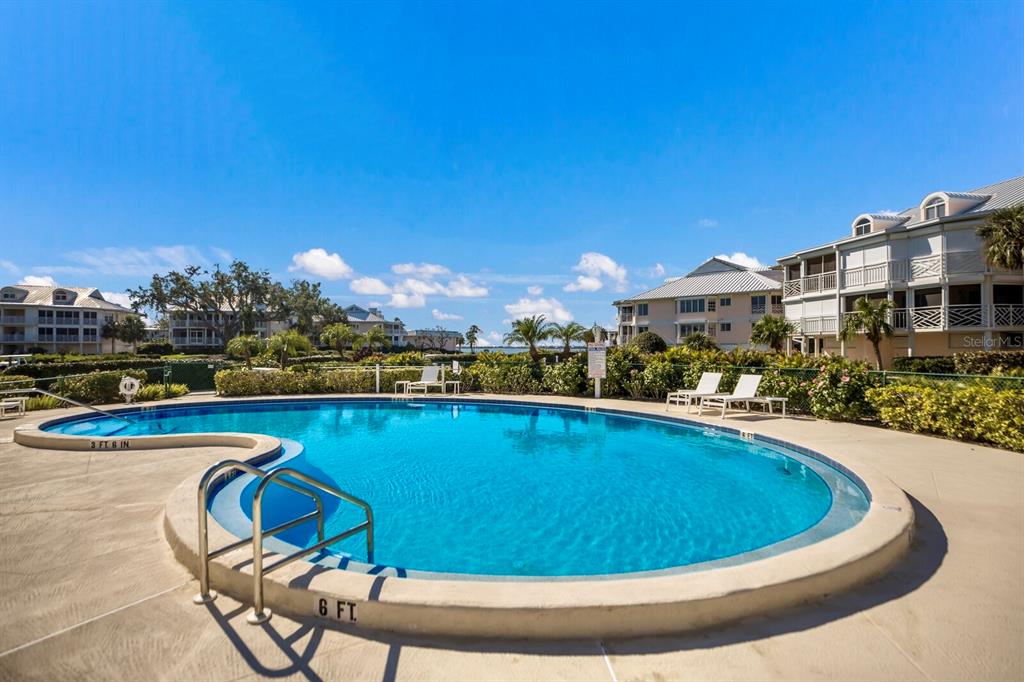 11000 Placida Road, Unit 2804 Placida, FL 33946 - Photo 42 of 56 a view of a swimming pool and outdoor space