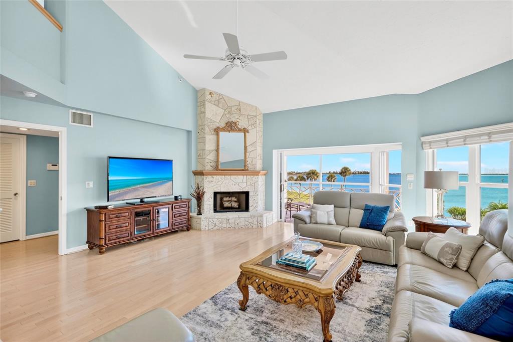 11000 Placida Road, Unit 2804 Placida, FL 33946 - Photo 6 of 56 a living room with furniture fireplace and a table