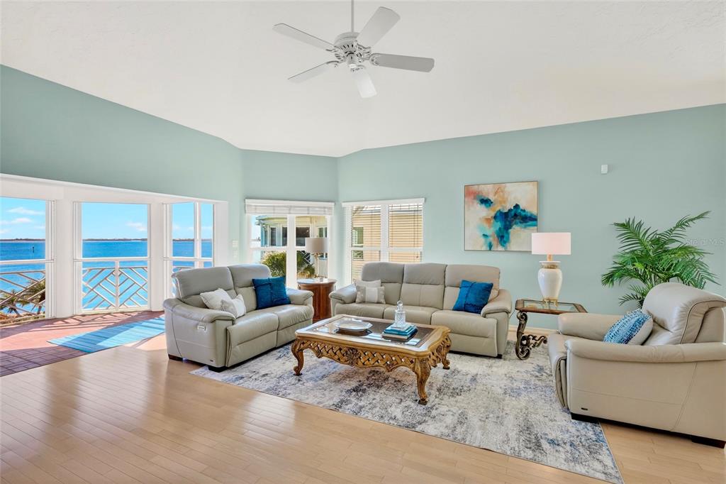 11000 Placida Road, Unit 2804 Placida, FL 33946 - Photo 7 of 56 a living room with furniture and a large window with outer view