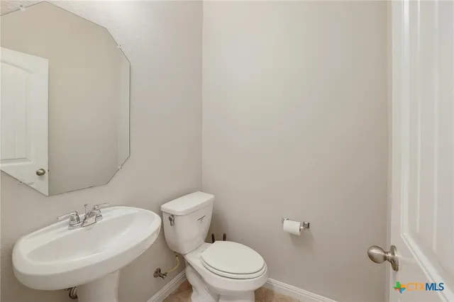 a swimming pool with wooden fence