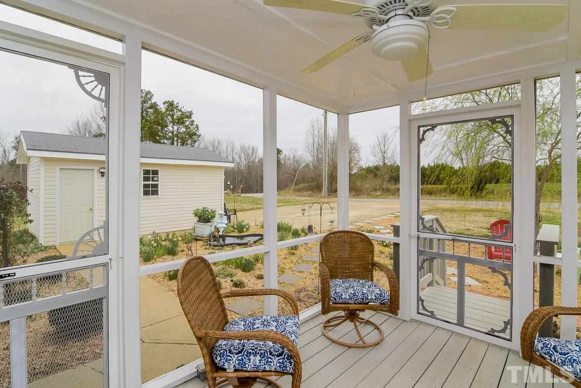 10129 Smith Road Middlesex, NC 27557 - Photo 6 of 25 a view of a dining room with furniture window and outside view