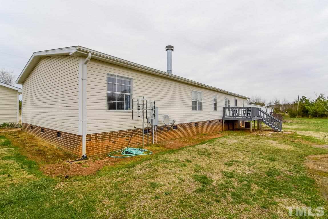 10129 Smith Road Middlesex, NC 27557 - Photo 7 of 25 a view of a house with backyard