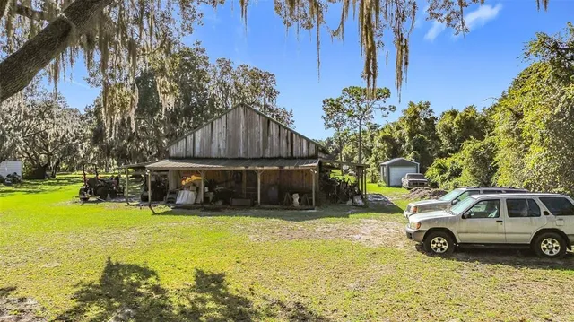 a view of a car park in front of house