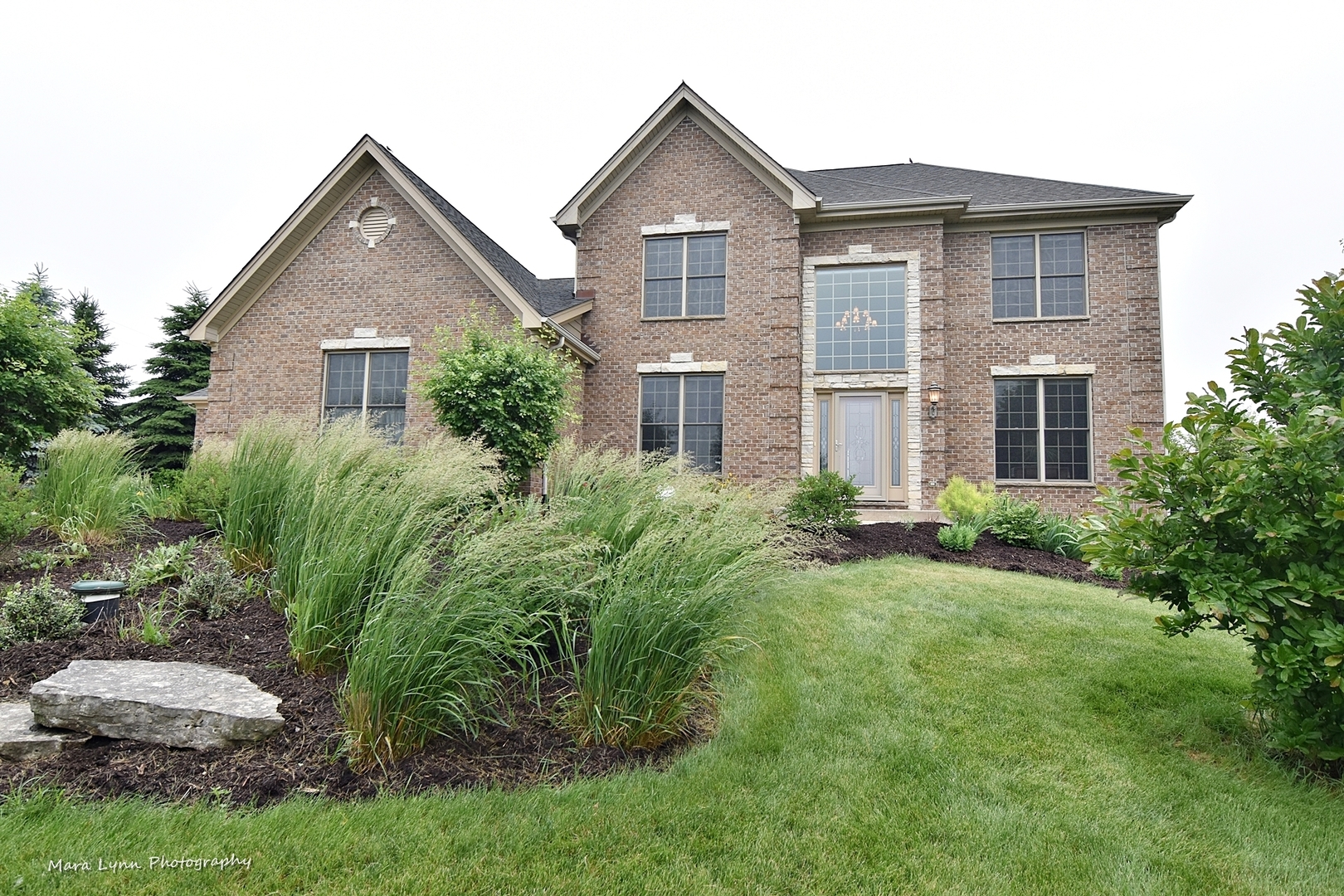 41-w035 Brown Road St. Charles, IL 60175 - Photo 1 of 33 a front view of a house with a yard and trees