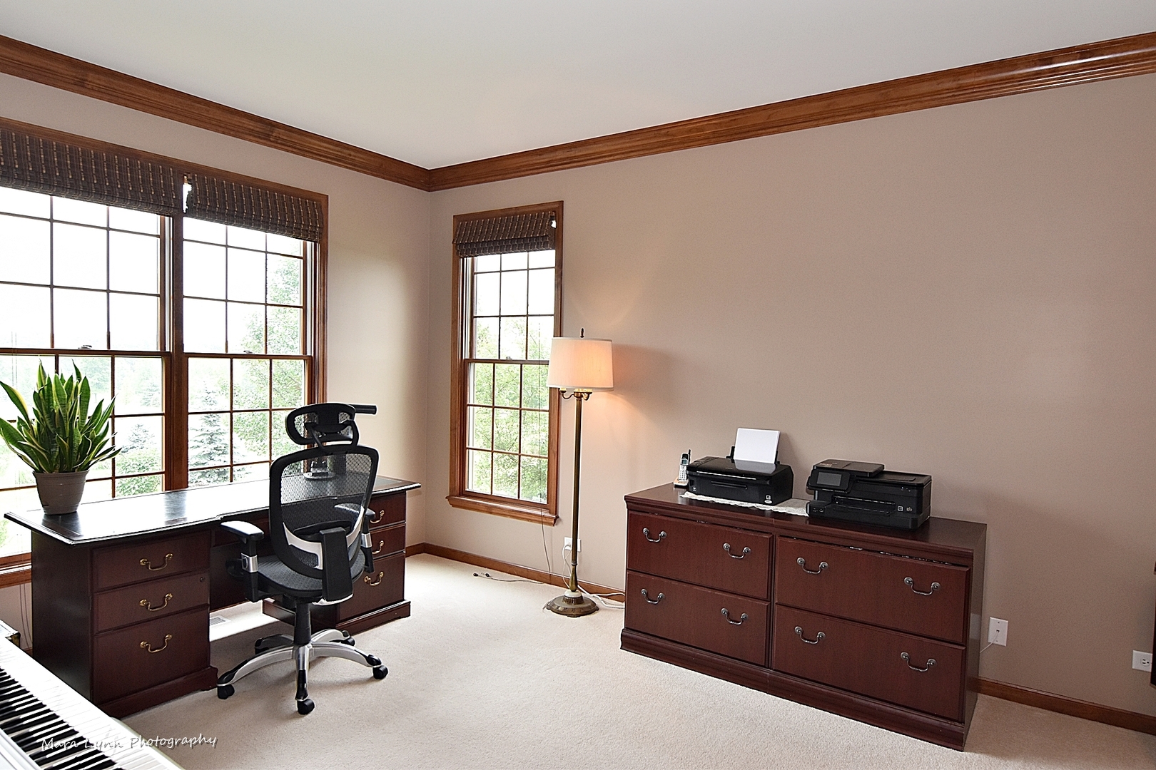 41-w035 Brown Road St. Charles, IL 60175 - Photo 16 of 33 a view of a workspace with furniture and a window